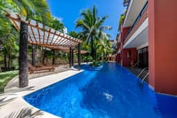 Spacious 2BR Condo with Pool & Private Balcony