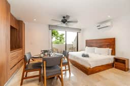 King Suite w/ Private Balcony, Gym + Rooftop Pool