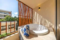 Modern 1BR w/ Private Jacuzzi | Pool + Balcony