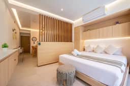Stylish 1BR | Gym, Rooftop Pool & Lounge w/Parking - Image 3