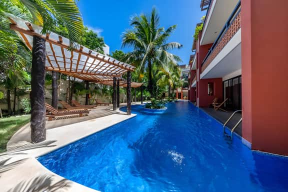 Spacious 2BR Condo with Pool & Private Balcony