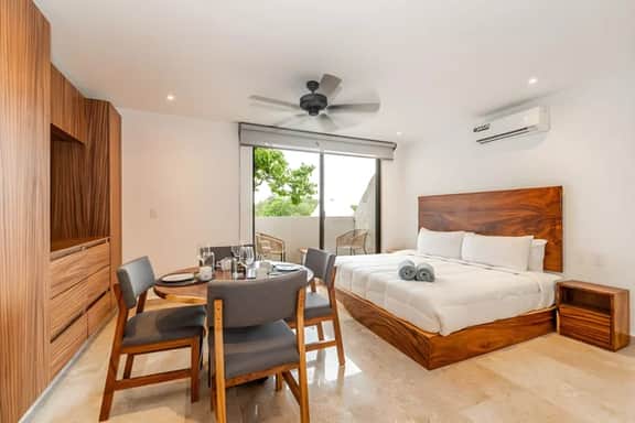 King Suite w/ Private Balcony, Gym + Rooftop Pool