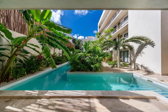 2 BR w/ Direct Walk-out to Pool + Sauna, Gym