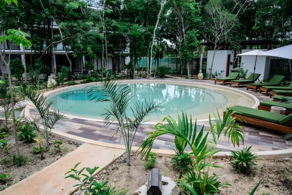 Stylish 1BD Retreat with Swim-Up Pool